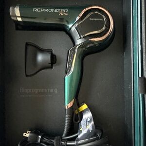 Repronizer biprogramming hair dryer that repairs hair